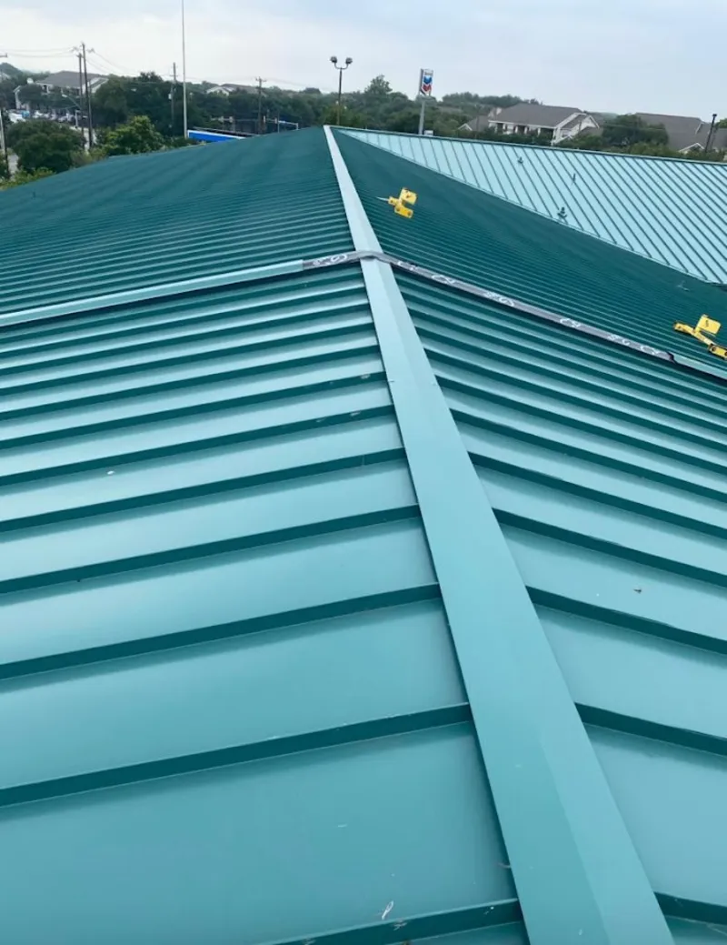 Green commercial metal roof ridge and valley for Metal Roof Repair in Miamisburg